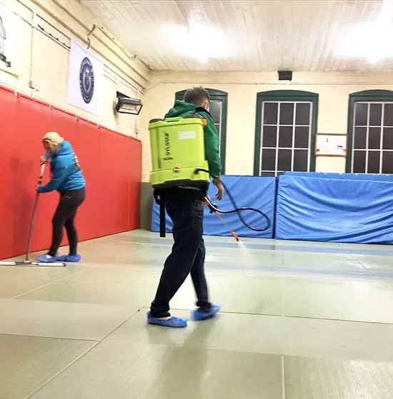 Cleaning and disinfecting the mats used for Beginners BJJ classes at Pure Art BJJ Portsmouth